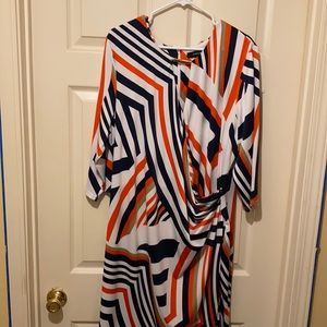 Form Fitting Dress. Key-hole opening in front